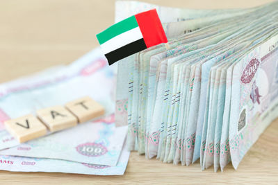 Concept on vat in uae. stack of five hundred bills, dirhams, closeup.