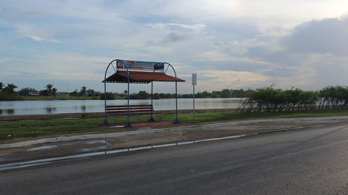 View of basketball by road against sky