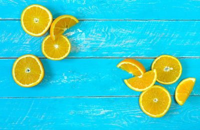 Orange fruit on blue background