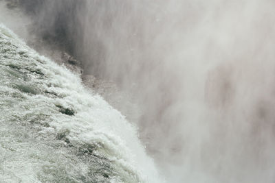 View of water splashing on rocks