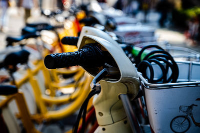 Close-up of scooter in parking lot