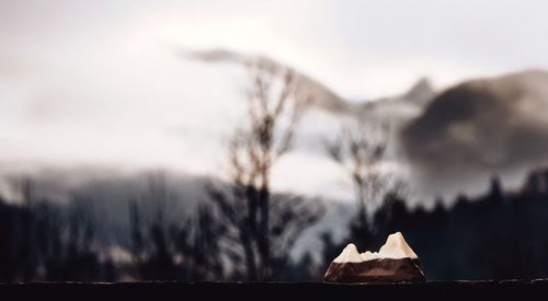 Mountain shape chocolate on railing