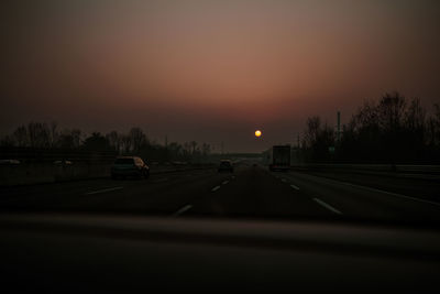 Cars on road at night