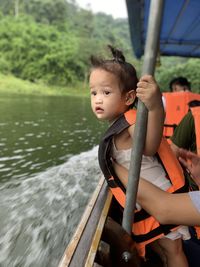 Portrait of boy sitting in car