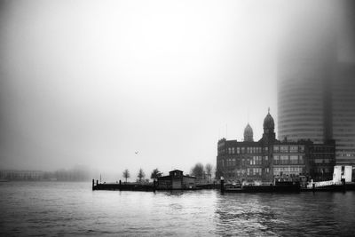 View of sea with buildings in background