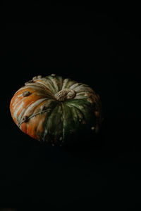 Close-up of pumpkin against black background