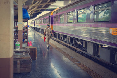 Train at railroad station during rainy season