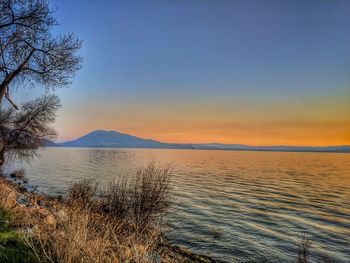 Scenic view of sea against sky during sunset