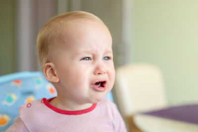 Portrait of cute baby at home