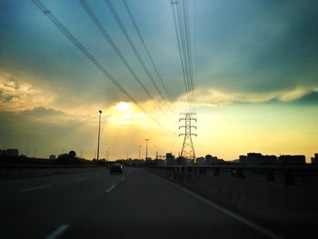 Empty road at sunset