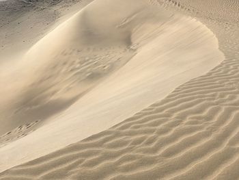 High angle view of sand dunes at beach