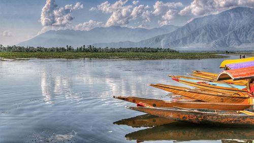 Boats moored in sea