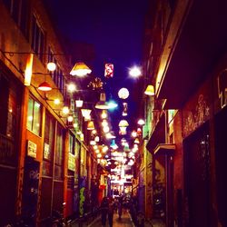 Narrow street in city at night