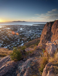 Overview of townsville, queensland, australia from a lookout on a mountain peak over the rooftops