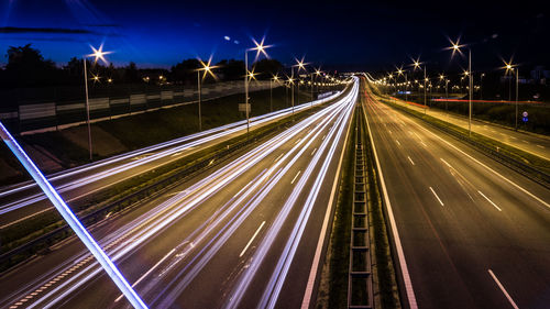 Light trails on road at night