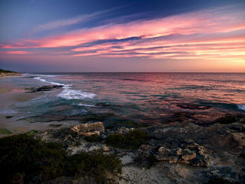 Scenic view of sea against sky during sunset