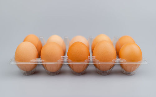 Close-up of macaroons against white background