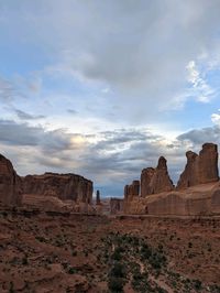 Rock formations on mountain against sky