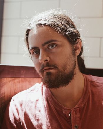 Close-up portrait of man at home