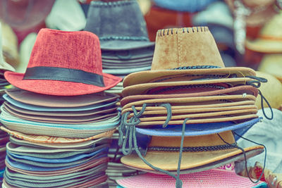 Close-up of multi colored objects on table at market stall