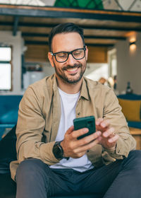 Young man using mobile phone