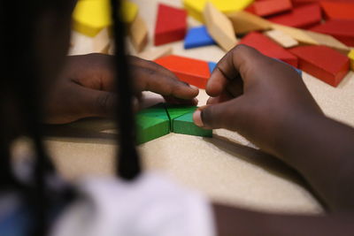 Close-up of girl playing with toy blocks