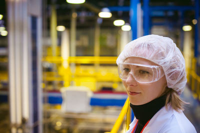 Scientist working in factory