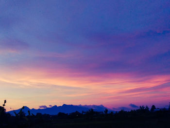 Scenic view of dramatic sky during sunset