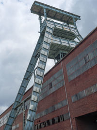 Low angle view of modern building against sky