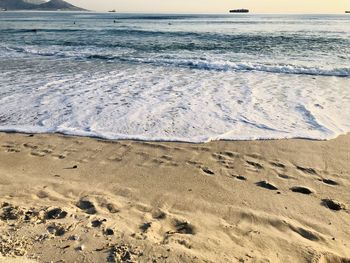 Scenic view of beach against sky