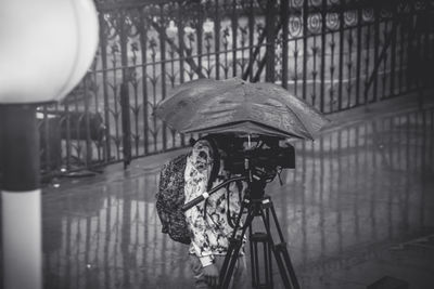 Close-up of wet bicycle during rainy season