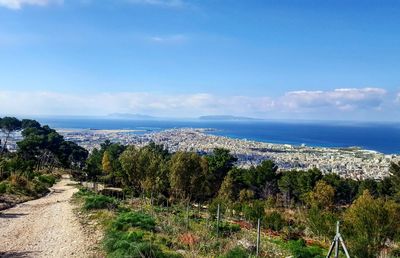 Scenic view of sea against blue sky