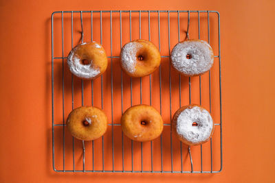 Directly above shot of tomatoes on yellow background