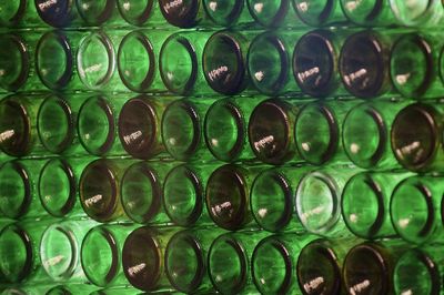 Full frame shot of green bottles