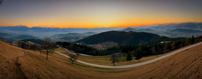 Panoramic view of landscape against sky during sunset