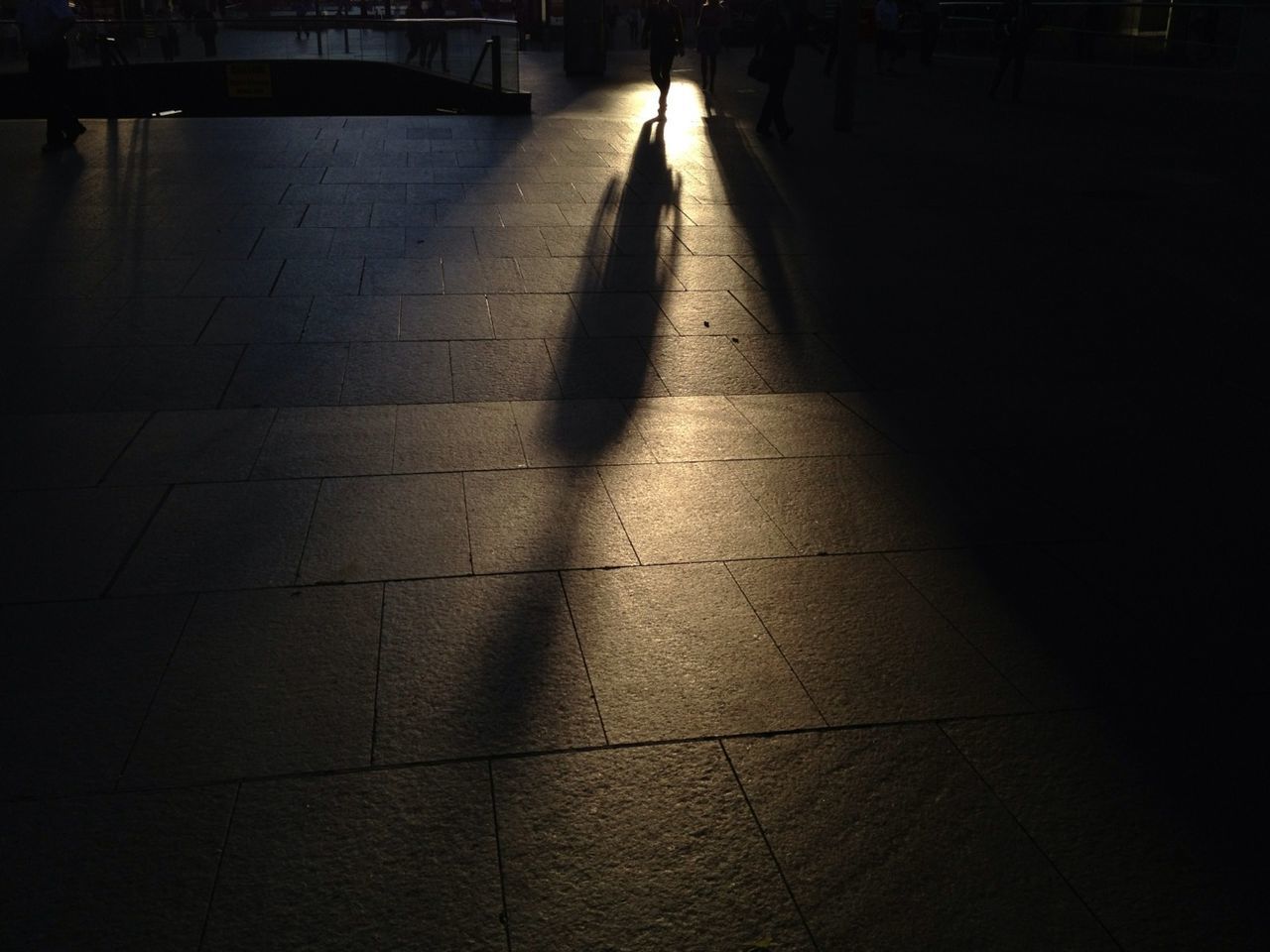 the way forward, tiled floor, diminishing perspective, paving stone, night, cobblestone, illuminated, flooring, walkway, footpath, shadow, in a row, empty, sunlight, vanishing point, indoors, built structure, architecture, pattern, pavement
