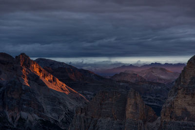 Scenic view of mountains against sky during sunset