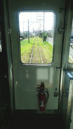 Train seen through window