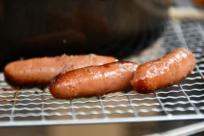 High angle view of meat on barbecue grill