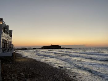 Scenic view of sea against sky during sunset