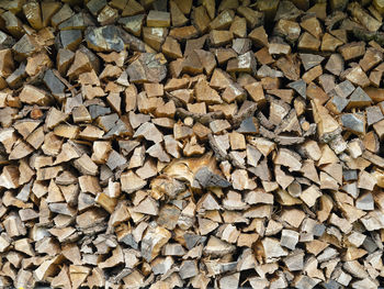 Large pile of chopped firewood