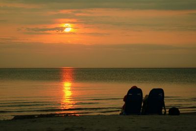 Scenic view of sea at sunset