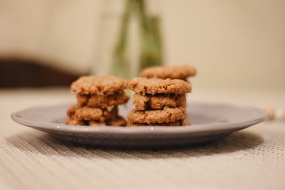 Close-up of cookies in plate on table