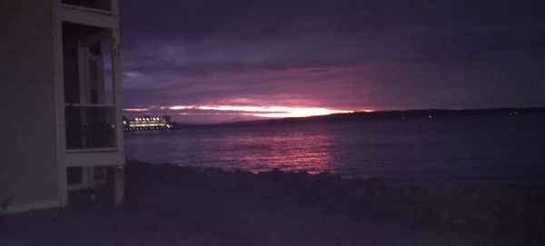 Scenic view of sea against sky at sunset