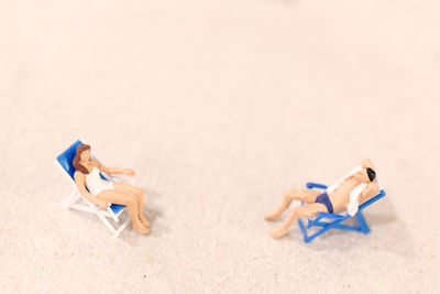 High angle view of toys on beach