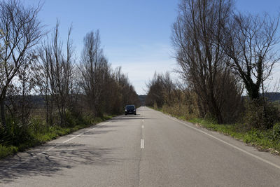 Road passing through country road