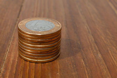 High angle view of coins on table