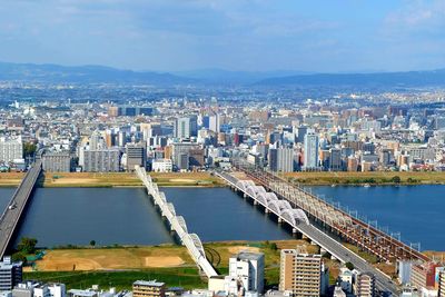 High angle view of buildings against sky in city