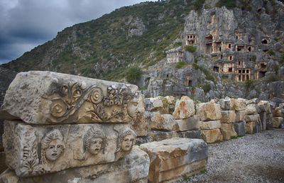 Carvings on stones at lycian rock tomb