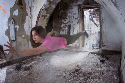 Young woman in corridor